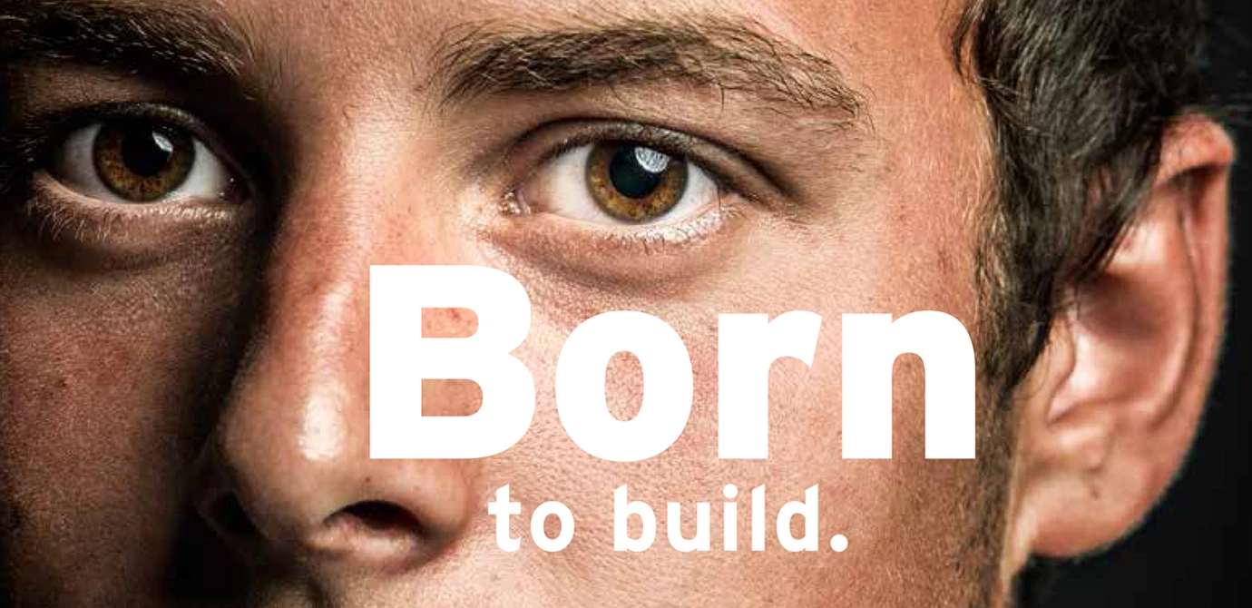 Nahaufnahme eines Männergesichts mit Text „Born to build“ und Lehrstellenhinweis